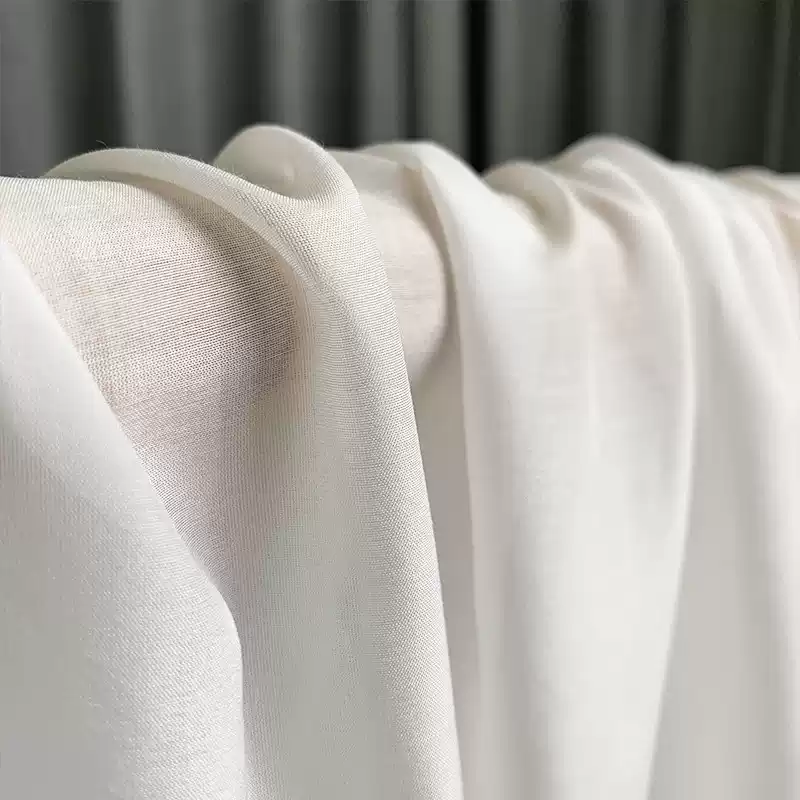 Unprinted silk cotton fabric in its natural solid colour