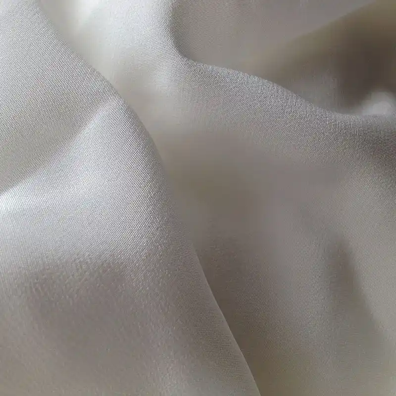 Unprinted silk crepe de chine fabric in its natural solid colour