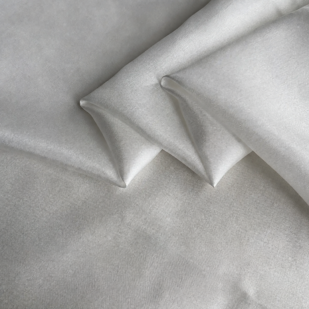 Unprinted silk habotai fabric in its natural solid colour
