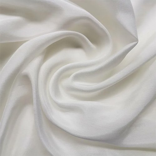 Unprinted silk modal fabric in its natural solid colour